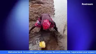 GIRL BY THE RIVERSIDE MAKING A MUDDY WATER WELL