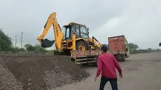 Bull machine unloading from trailer #bulljcb #bullbackhoe #bullmachines
