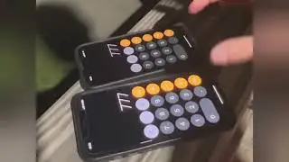 Magician performs magic tricks with two iPhones in viral video.