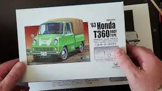 A box of cars and cartoons from HobbyLink Japan