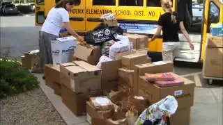 Fulton Homes (Un)stuff the Bus August 2011.wmv