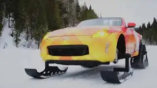 Sports car fitted with skis and snow tracks