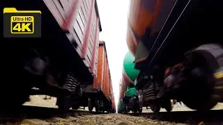 Sandwiched between two Freight Trains ...4k video
