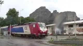 Greek trains, RARE 7 cars long train 885 departing from Kalabaka under rain