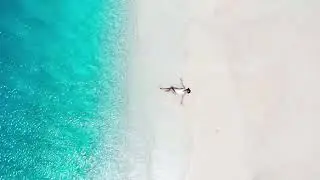 Maldives Sandbar and Ocean Waves Captured in Smooth 4K Drone Footage