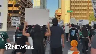 Protestors march through downtown Phoenix Sunday