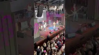 Playing guitar at CMA Fest with Brendan Walter