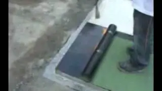 Torch applying bituminous sheet waterproofing membrane