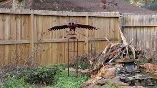 Kinetic owl sculpture