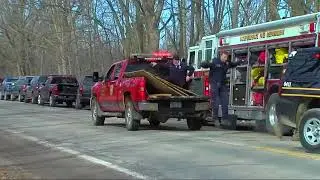 Crews rescue man stuck in waist-deep mud
