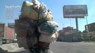 140212 1133 A pickup overloaded on Ring Road