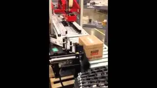 Label Applicator applies label to side and back of case