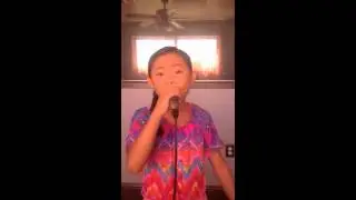 Mackenzie Walker sings The National Anthem
