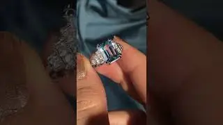 Emerald Cut Blue Topaz and Step Diamond Engagement Ring