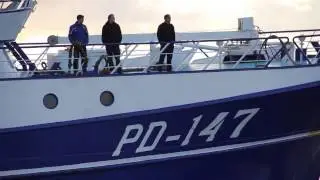 Verdronken Urker visser aan wal gebracht in Harlingen