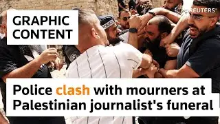 WARNING: GRAPHIC CONTENT &ndash; Police clash with mourners at Palestinian journalist's funeral