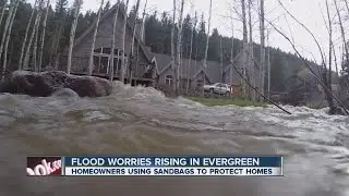 Evergreen homeowner prepares for possible flooding