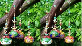 Handmade Ceramic hanging bells with flowers.