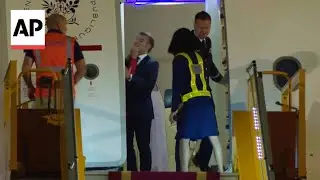 Video shows France's first lady pushing Macron as president calls it 'playfighting'