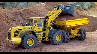 EARTH MOVER 870k WHEEL LOADER & VOLVO A40F DUMPER