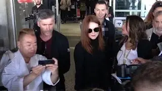Actress Julianne Moore arriving in Cannes airport in a chaos