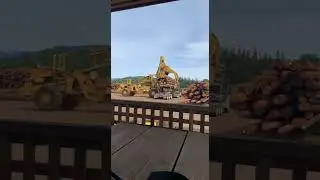 Letourneau Log Stacker unloading truck
