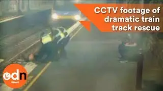 CCTV footage captures dramatic train track rescue