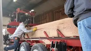 Cooks AC36 slabbing a 20-in. cant finishing with center cut 2x4s.