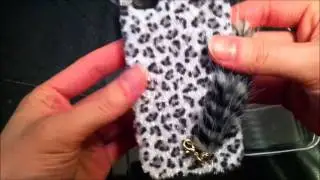 Leopard Grain IPhone Case with a fluffy tail