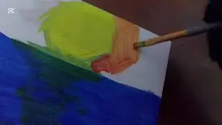 Painting a sunset while classical music carries the vibe.