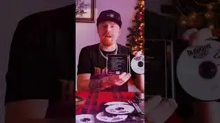 Signing 1990 CDs