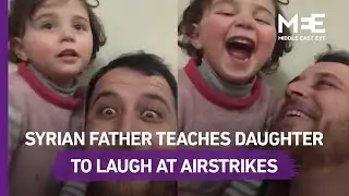 Father teaches Syrian girl to laugh at airstrikes
