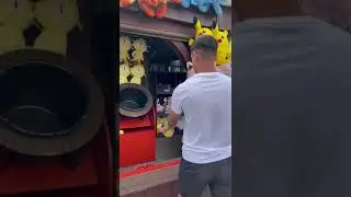 Watch me beat this impossible Carnival Game #carnival #carnivalgames #buckettoss #aim