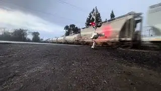 UP 8006 Leads Mixed Freight Train Through Town In The Rain!