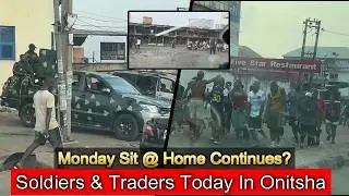 Soldiers Mount: While Onitsha Traders Are Doing This Instead