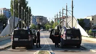 NATO-led peacekeepers remove roadblocks in Kosovo near border with Serbia