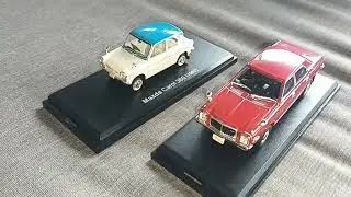 Diecast 1/43 scale 1977 Mazda Luce and 1962 Mazda Carol 360.