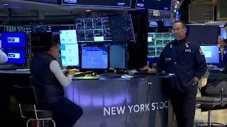 Dow closes above 50,000, Nvidia soars as traders focus on AI spending