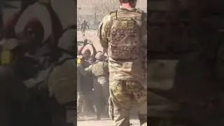 Illegal immigrants broke through a fence with razor wire and rush border patrol in el Paso TX.