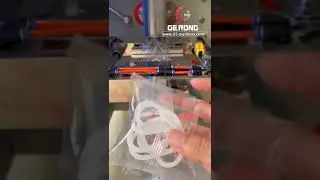 Curtain plastic lock button automatic counting feeding bag packaging machine