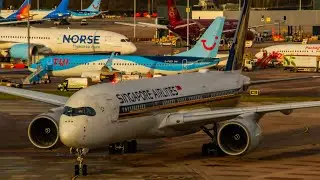 Singapore Airlines A359 9V-SMJ Taxis into stand at Manchester Airport