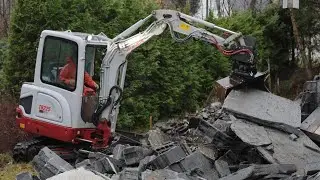 Garage demolition with #Takeuchi TB225 #SMP rototilt 