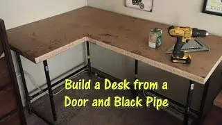 Build a Desk Using an Old Door and Black Pipe by @GettinJunkDone