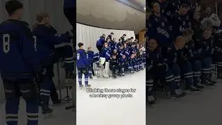 Nackarockers hockey players climbing for a group photo