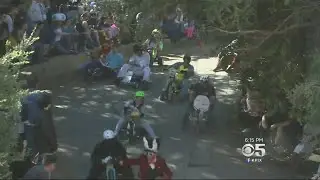 BIG WHEELS:  San Francisco stages its annual Easter Sunday big wheel race