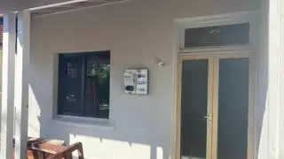 Plastering and Rendering Dulux Acrylic Texture Coat over Painted Sand Finish Render