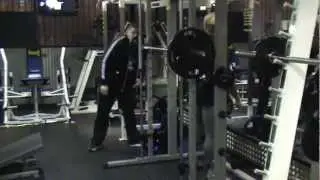 Neale Cranwell doing wide stance assisted squat with Nathan Harman and booost oxygen
