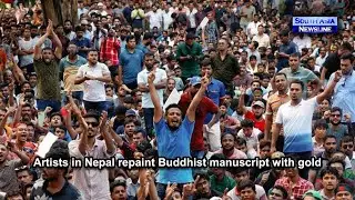 Artists in Nepal repaint Buddhist manuscript with gold