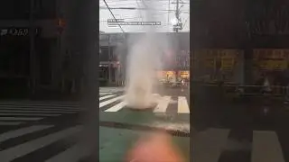 Manhole Cover Spurts Floodwaters in Tokyo