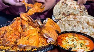 Eating Bhuna Murgh, Dum Chicken biryani, Butter rotis, Butter Paneer